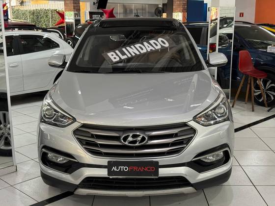 HYUNDAI SANTA FÉ 3.3 MPFI 4X4 7 LUGARES V6 270CV GASOLINA 4P AUTOMÁTICO HYUNDAI SANTA FÉ 3.3 MPFI 4X4 7 LUGARES V6 270CV GASOLINA 4P AUTOMÁTICO